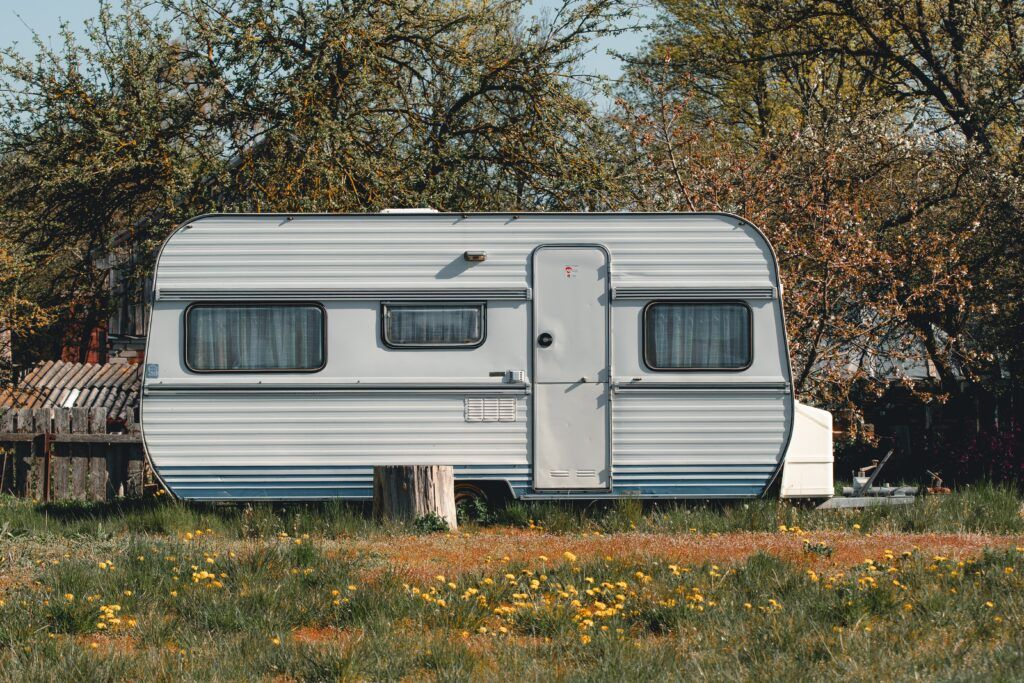 Mobile home on field of grass